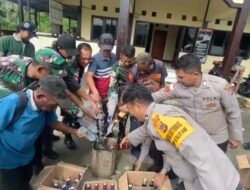 Perkuat Sinergi TNI-Polri Dan Masyarakat, Polsek Waris Gelar Halal Bihalal Dan Musnahkan Miras Hasil Razia